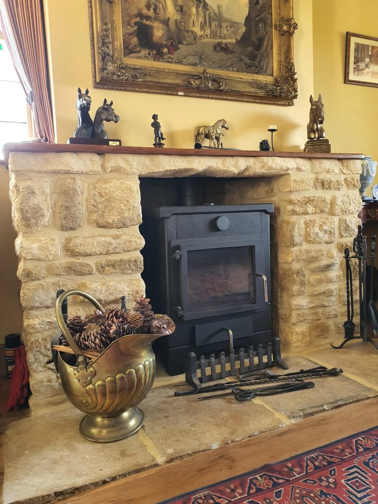 Bespoke Farmcote design - in lay slips and false beam of stone to support mantle